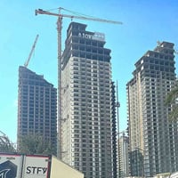 شقة للبيع في مجمع داون تاون بالمنصور البيجية  قرب مطار المثنى  مساحتها...