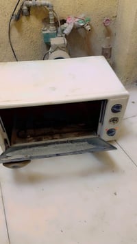 فرن كهربائي • شغال • بدون صينية