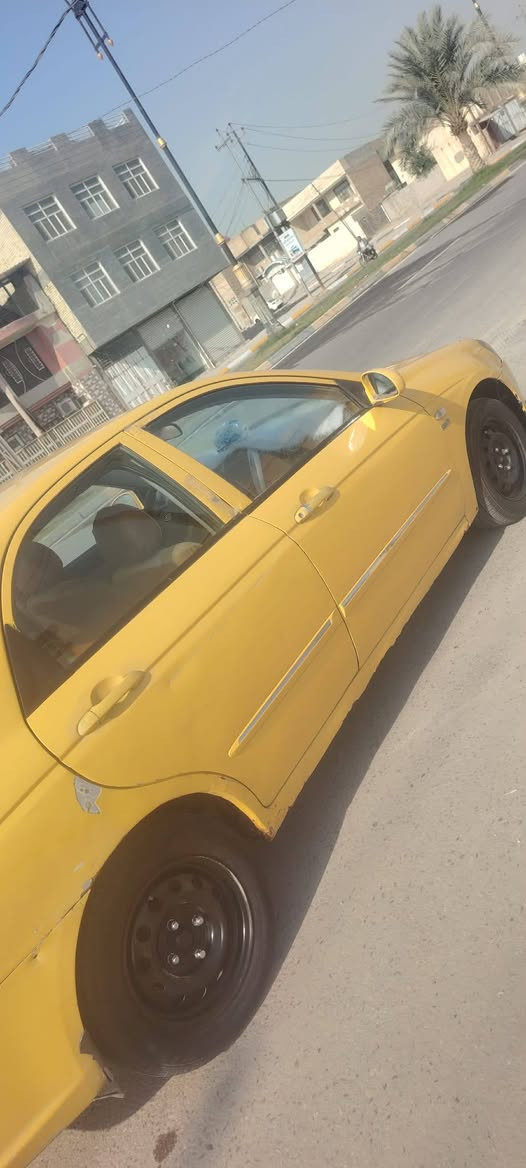 السياره سيراتو كير عادي المكينه1600 سعر58وبيهه مجال قليل المكان كربلاء الجاهز رقم الهاتف ***********
