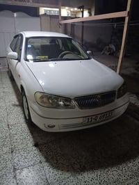 نيسان سني ياباني 2006جاهزه كل نقص مابيه بيه باب الخلف السائق صبغ سعرهه...