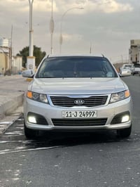 اوبتيما • ٢٠٠٩ • ماشي ٢٠٠ الف