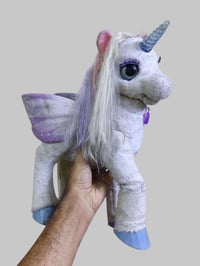 حصان يونيكورن • تفاعلي • توصيل العراق