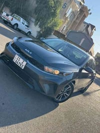 كيا فورتي 2023 LXS فول مواصفات كشنات جلد  تحكم ستيرن كشنات جلد لون نفط...