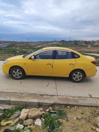 افانتي 2009للبيع رقم بغداد بسمي مكفوله كفاله عامه  مصفره هيئه  سياره ج...