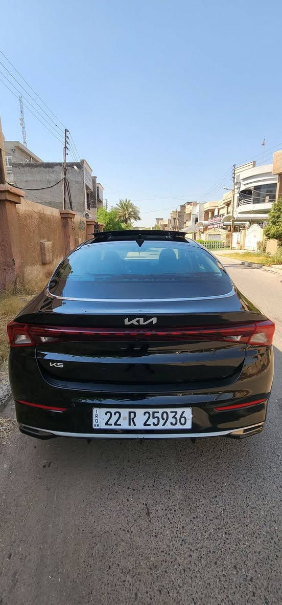 2024  KIA K5, EX 
•الرقم: اربيل تحويل للمشتري مباشر
 فقط اربع أصابع تكحيل بالبنيد  بدون اي ضرر داخلي شاصي لغد كفالة بدون رصعات بدون شخوط جدا نظيفه 
•المواصفات :
▪️السيارة: #كيا K5 EX اسود 
▪️الموديل: 2024
▪️حجم الويل: ويل كب حجم 19 
▪️لايتات زينون اربع عدسات مع حاجب LED مع اشارة LED
▪️بصمات عدد 2 للأبواب مع بصمة تشغيل وتشغيل عن بعد
▪️قمارة بانوراما
▪️نظام 5 كامرات
▪️رادار امامي مانع تصادم
▪️حساس امامي
▪️حساس خلفي
▪️رادار جانبي (نقاط عمياء) بالمرايا الجانبية
▪️شاحن لاسلكي
▪️اشاير بالمرايا الجانبية
▪️مرايا شفط
▪️مرايا قلاب
▪️كامرة خلفية دوارة اصل مع الستيرن
▪️شاشة الدشبول حجم كبير للتحكم بأيعازات السيارة
▪️كشنات السيارة جلد lبيض
▪️گشن ذاكرة (خزن ميموري) لكرسي السائق
▪️تحكم فول كهرباء لكرسي السائق والراكب
▪️تدفئة وتبريد للگشنات الأمامية
▪️تبريد قطعتين امامي وخلفي
▪️خمسة وضعيات للقيادة
▪️تشغيل عن بعد
▪️سستم صوت BOSE بواقع 12 سماعة في المركبة
▪️سايد بريك دگمة
▪️تحكم ستيرن جهتين بلوتوث وحاكية وكروس سرعة وتحكم صوت 
▪️نظام ABS مانع انزلاق
▪️السيارة فئة EX فول اعلى فئه 
السعر مناسب 190 وبيه مجال
مكانه بغداد المنصور 
للاتصال على الرقم ***********
