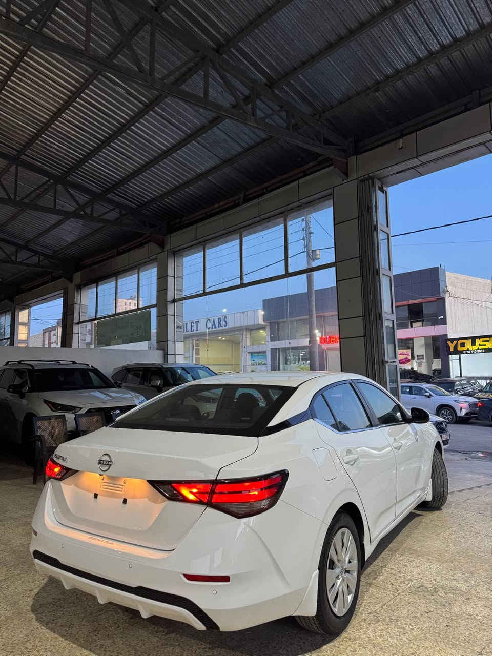 نيسان سنترا موديل 2024 S 
سياره بيدون دعم بجم كبس فقط البابين امشخطه

ماشيه 18 mil سياره جديده ره قم تلفون واتساب 
(***********)📞 زاخو, دهوك
