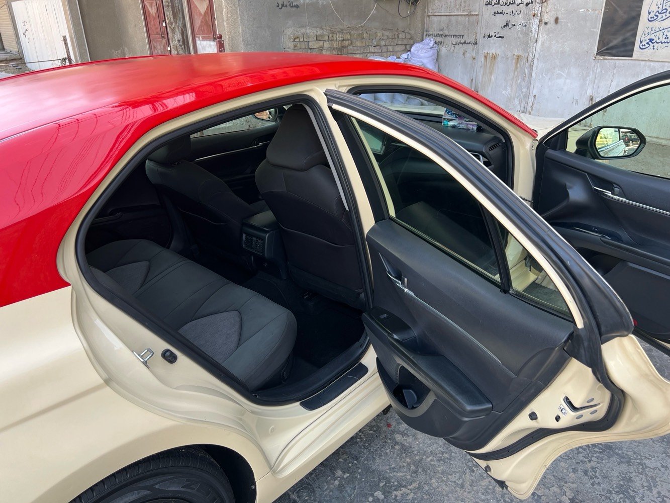 كامري موديل2023اصل السيارة مكفوله ما عده باب بي تصليح مكان السيارة بغداد الطالبيه