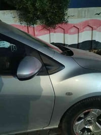 Mazda 2 2014 حادثها جاملغ وبنيد بدون دواخل السياره كير ومكينه خير من ا...