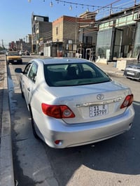 يا الله تيوتا كورولا 2010 أمريكية نص مواصفات، لون سلفر، محرك 1.8 اقتصا...