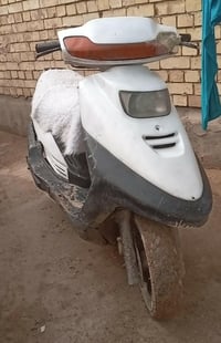 دراجة كهربائية • فضي • سرعة ١٠٠