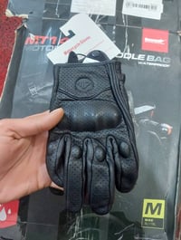 كفوف جلد جديد • ماملبوس • توصيل