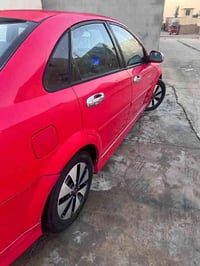 اوبترا رقم بغداد نكليزي    مكفوله من صبغ وضربه ومحرك وكير موديل 2007 ع...