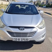 توكسان خليجي 2013 ماشية 130km رقم بغداد بأسمي لون رصاصي سلفر مكفول محر...