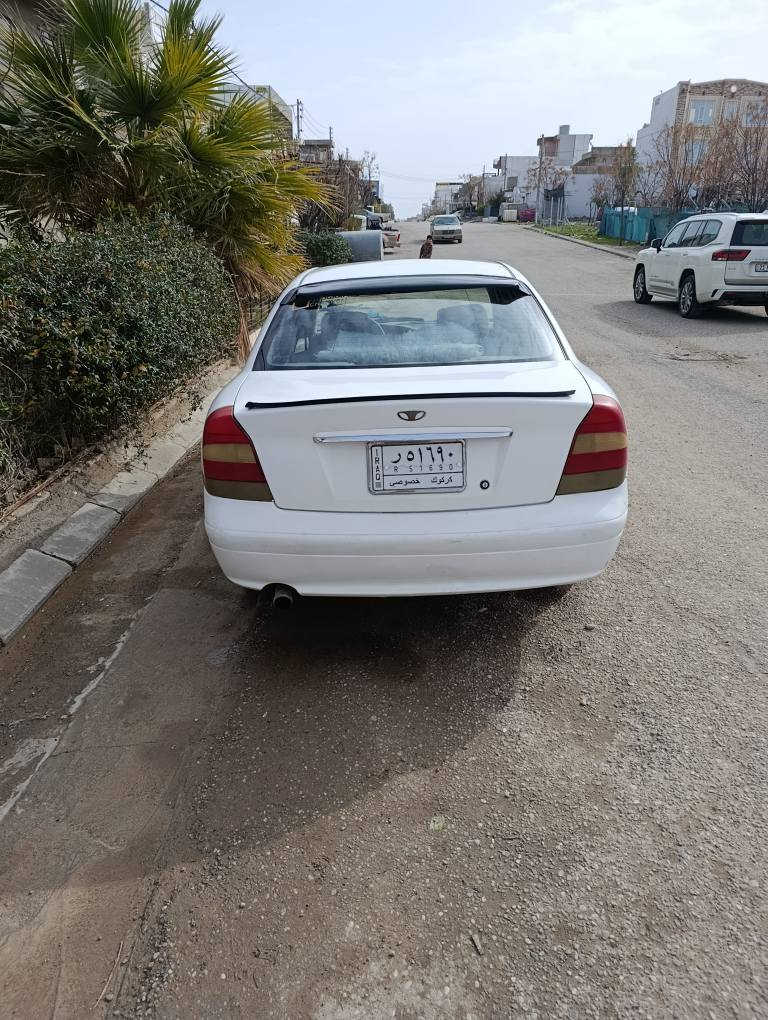 دایو نوبرا2 مودیل 99تبرید سارد و گەرم ناو فۆرمیکا مەکینەو گێڕ بە شەرت پەڵە پەڵە معجونی هەیە لەسەر ساغی سنوی بەسەر چووە کۆبۆنی بەنزینی هەیە بەشرتی تحویل رقم مبایل *********** شمشمل, السليمانية
