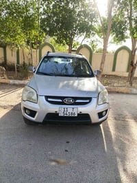 سبورتج ٢٠٠٩  للبيع( ١٠٣ $) وبيهه مجال بسيط  اللون سلفر  بيهه تبديل بني...