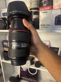 يتوفر الان  عدسة كانون 24-105 جيل الثاني رنك احمر السعر 750 الف عدسة ك...