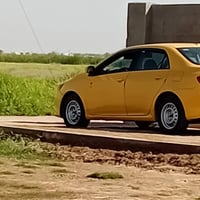 كورلا تكسي • ٢٠٠٩ • اصفر