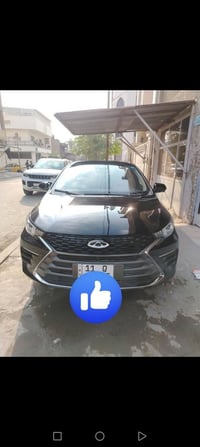 شيري اريزو 6 فول مواصفات موديل ٢٣ لون اسود رقم بغداد ماشيه 8000 مكفوله...