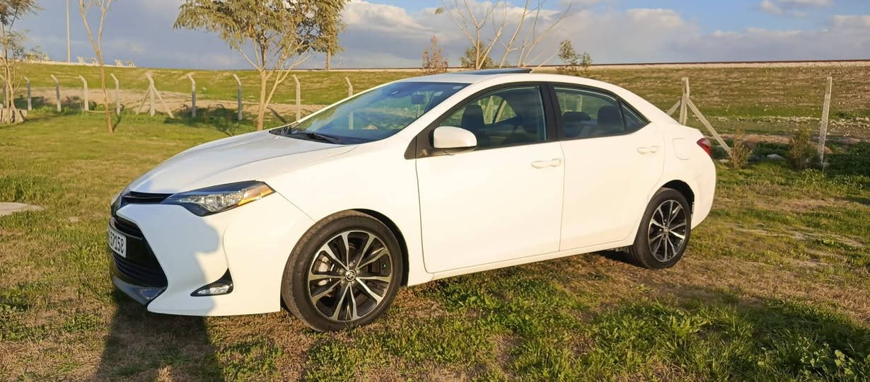 سلام عليكم سياره للبيع تويوتا كورولا موديل 2018 سياره فول مواصفات سياره فقط بها بابف باب خلف السائق رش سياره بدون دواخل سياره كلش حلوه سنويه رقم جديد باسم شرط التحويل عنوان كركوك اتصال ***********
