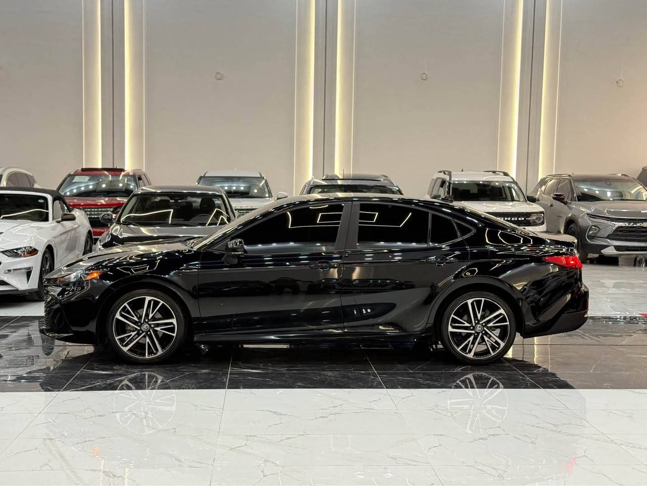 𝟐𝟎𝟐𝟓 𝐓𝐎𝐘𝐎𝐓𝐀 𝐂𝐀𝐌𝐑𝐘-𝐋𝐄 𝐁𝐋𝐀𝐂𝐊

تويوتا كامري (LE BLACK) موديل : 2025

اللون : اسود

عداد المسافة : 37 الف

حجم المحرك : 2.5L (4.سلندر) هايبرد

ملاحطة السيارة : فقط بونيد صبغ بدون دواخل

كافة الايرباكات سليمة 100%

المواصفات : 𝐋𝐄 𝐁𝐋𝐀𝐂𝐊

داخـــل بیجـــي

كيـــج الكتـــرونـــي

شـــاشة كبير لمـــس

شحن وايــــر ليـــس

كــــاميــــرة

ابـــواب  بصمة

بصمة تشـــغـــيل 
تشـــغـــيل عـــن بعد 

هـــانـــد بـــريـــك بصمة

اوتو هولد (𝐀𝐔𝐓𝐎 𝐇𝐎𝐋𝐃)

اوتو ستارت (𝐀𝐔𝐓𝐎 𝐒𝐓𝐀𝐑𝐓)

اوتو ستوب (𝐀𝐔𝐓𝐎 𝐒𝐓𝐎𝐏)

رادار امامي (تحديد مسار)
‏‎
رادار جانبي (نقاط عمياء)
‏‎
رادار خلفي (التحذير من الاصطدام)
‏‎
حساسات امامي
‏‎
حساسات جانبي 
‏‎
حساسات خلفي 

مانع انزلاق+𝐀𝐁𝐒

نظام (𝐄𝐂𝐎)

نظام (𝐍𝐎𝐑𝐌𝐀𝐋)

نظام (𝐒𝐏𝐎𝐑𝐓)

تحكيم استيرن

تبريد لمس

تبريد مركزي

كشنات كهربائي

لايتات (𝐋𝐄𝐃) ليـــد عدسة زينون

بكلايتات (𝐋𝐄𝐃) ليـــد

ويــــل كــــروم حجم 19

‏‎تفاصيل اكثر الاتصال علی ارقام التاليه  

WhatsApp☎️***********

WhatsApp☎️***********

عنوان📍اربيل فرع ناقلات

معرض كاليفورنيا كارسCALIFORNIA Cars أربيل, العراق
