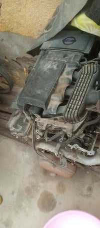 محرك نيسان 2006 كامل بس الكرنك كورات السعر 8 اوراق07709606117