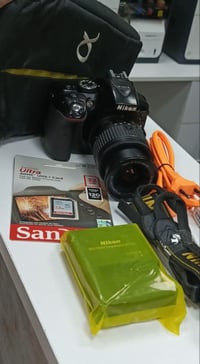 كامرة نيكون 5300D مستعمله شي قليل شاحنه او كيبل شاحنه  عدسه الاصلية +ع...