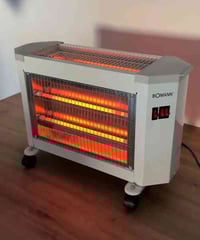 صوبة كهربائية ثلاث أوجه ماركة بومان  تحتوي على خمس شمعات قوية  لتفاصيل...