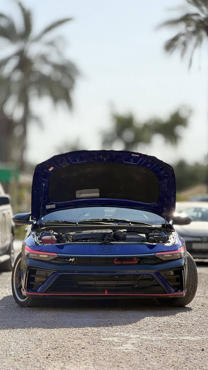 🐙 للبيع – Hyundai Elantra N
الموديل: 2024
المحرك: 2000cc Turbo
القوة: 280 حصان
القير: عادي (Manual)
اللون: أزرق
الممشى: 8500 ميل (mi)
الحادث:
صبغ خشم الجاملغ الايسر
صبغ حافة البنيد
بارد في الجاملغ الامامي الايمن
بارد في الجاملغ الخلفي الايمن
 رصعة في السقف نتيجة التحميل ونقل
رصعة في الباب الخلفي مصلحة بارد

المواصفات:
• شاشة متصلة كبيرة
• نظام صوت Bose
• شحن لاسلكي للهاتف
• إنارة داخلية Ambient
• كراسي رياضية Recaro
• تدفئة مقاعد
• بصمة تشغيل
• تحكم من المقود
• نظام Rev Matching
• نظام تعليق رياضي متغير
أنظمة الأمان والمساعدة:
• رادارات أمامية
• نظام مانع تصادم
• نظام النقطة العمياء (Blind Spot)
• مثبت سرعة
• نظام تحديد المسار (Lane Assist)
• حساسات أمامية وخلفية
• كاميرا خلفية
• إشارة بالمرايا الجانبية
التعديلات:
• جنوط Rays
• إضاءة أمامية LED متغيرة
• Air Duct / فتحات هوائية رياضية
• واقيات (Mud Guards)
📍 الموقع: بغداد
📞 التواصل: ***********/***********
💰 147$ وبي مجال بسيط للشراية

…اضافة الى صور الحادث مدرجة وسونار للسيارة:
