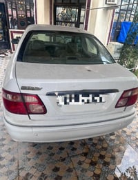 صني • ٢٠٠٠ • رقم بغداد دولي