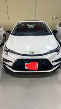 للبيع كورلا هايبرد 2025 الشكل الأمريكي  محرك 1.8 رقم بغداد سنوية بإسمي...