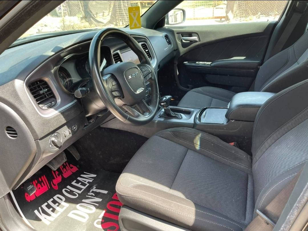 جارجر  2019 بغداد  سوداء اللون st
ماشية 88,950 كيلو  او 55,500 ميل  تقريبا  وقابل للزيادة 
الحادث بسيط لكن مبدل بنيد ودعاميه جي تي
ويل عنكبوت بلادي
كشن السائق كهرباء 
شاشة اعتيادية
كشنات مغلفه جلد احمر واسود من الداخر  وبحالة جيدة جدا
بيها طخة اسفل الباب الخلفي 
السعر المطلوب 19,800دولار
***********
