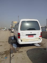 فوتون • ٢٠٠٩ • رقم احمر