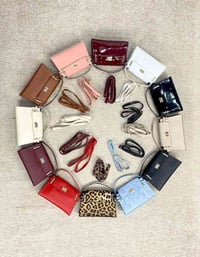 تنزيلات الخفاجي • شارع لصنعاء • محلات هاشم