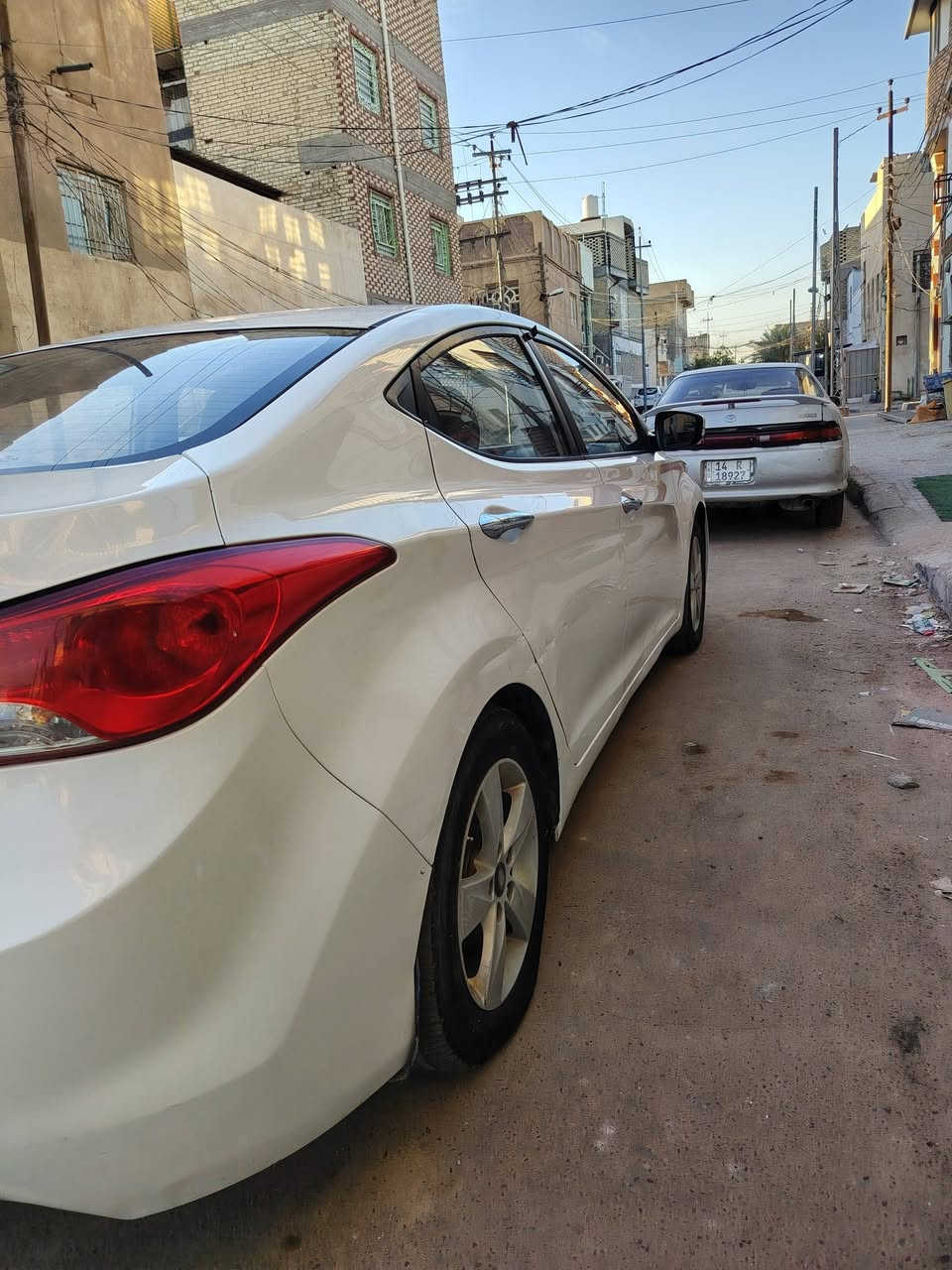 :🚗 هيونداي إلنترا 2014 (خليجي) للبيع - في النجف  :   : خليجي، مواصفات فول عدا البصمة (سويتش) 🌟فتحة سقف (سلايد روف)تحكم ستيرن كامل وباقي مواصفات الفول الخليجي المعروفةالمحرك والـكير: محرك حجم 1800cc وكير بحالة ممتازة جداً، سيارة جاهزة من كلشي وما تحتاج أي مصروف ⚙️حالة البودي: بيها 4 قطع ، وللأمانة والضمان نبيع (حزام)، والداخل مكفول ونظيف جداً.السعر المطلوب: 88 ورقة (8,800$) وبيه مجال  للشراي  💵مكان السيارة: النجف الأشرف - شارع المدينة 📍  .📞 للتواصل والاستفسار:رقم الهاتف: [  ***********  ]المراسلة: متواجد [اتصال / واتساب]
