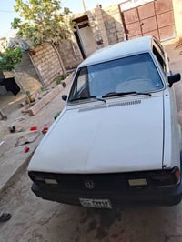 ١٩٨٧ • شرط الوكالة • كاربون بنزين