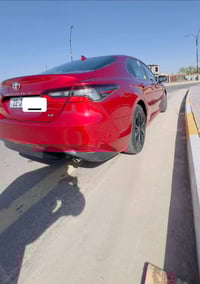 اسلام عليكم للبيع كامري 21  رقم اربيل دولي باسمي  شرط التحويل   ضرر جا...