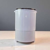 غسالة ملابس • حوض