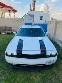 للبيع جالنجر 2013 وارد امريكي بيها قطع صبغ بدون دواخل عل فحص محرك 8 سل...