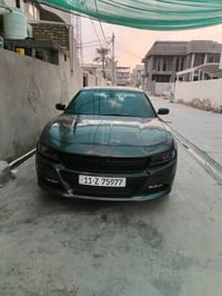 جارجر 2023  ماشيه 10 الف    فتحه سقف     شاشه كبيره  حساس خلفي    تشغي...