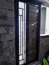 أبواب سي ان سي • حديد ثقيل • الرمادي شارع 60