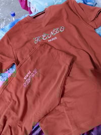 لارج اكس • ملابس