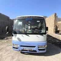 كوستر نيسان 2002محرك كير اكسل شرط صبغ بس بل ازرق نقص تبريد كمبريسل  مح...