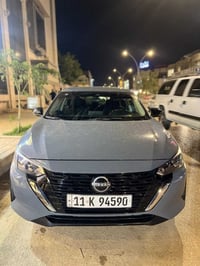 نيسان سنترا   الموديل 24  اللون سمنتي مميز  فىة SV فول عدا الفتحة   ال...