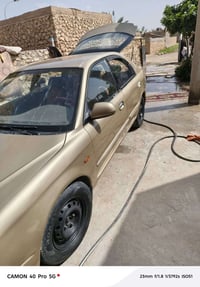 كيا اسبكترا 2002 رقم بغداد سنويه لل٢٧ محرك وكير خير من الله لا تنقيص و...