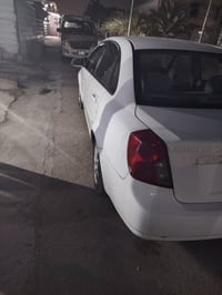 اوبترا موديل ٢٠١١ بسمي رقم بغداد سياره احله من الصوره بيهه باب واحد تب...