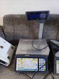 ميزان إلكتروني • بابل القاسم • خلف دائرة الماي