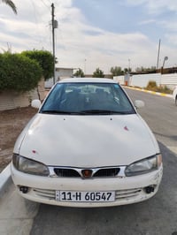 سلام وعليكم بروتون موديل 2004 كير اوتماتيك تبريد شغال وايضا تدفئه بيه ...