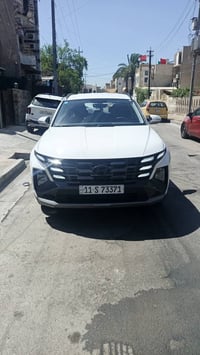 للبيع توسان ٢٠٢٥ خليجي رقم بغداد  مكينه٢٠٠٠دوش السياره بصمه شاشه جبيره...