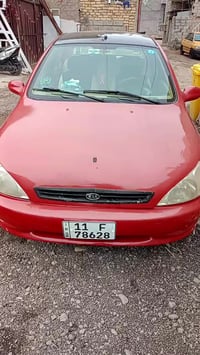 كيا ريو للبيع موديل 2001 بغداد الرقم الجديد بأسمي كير مكينه مكفول  تبر...