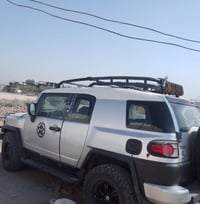 تيوتا اف جي موديل ٢٠٠٧ للبيع او المراوس بيه ٣ قطع صبغ فقط لون سلفر بغد...